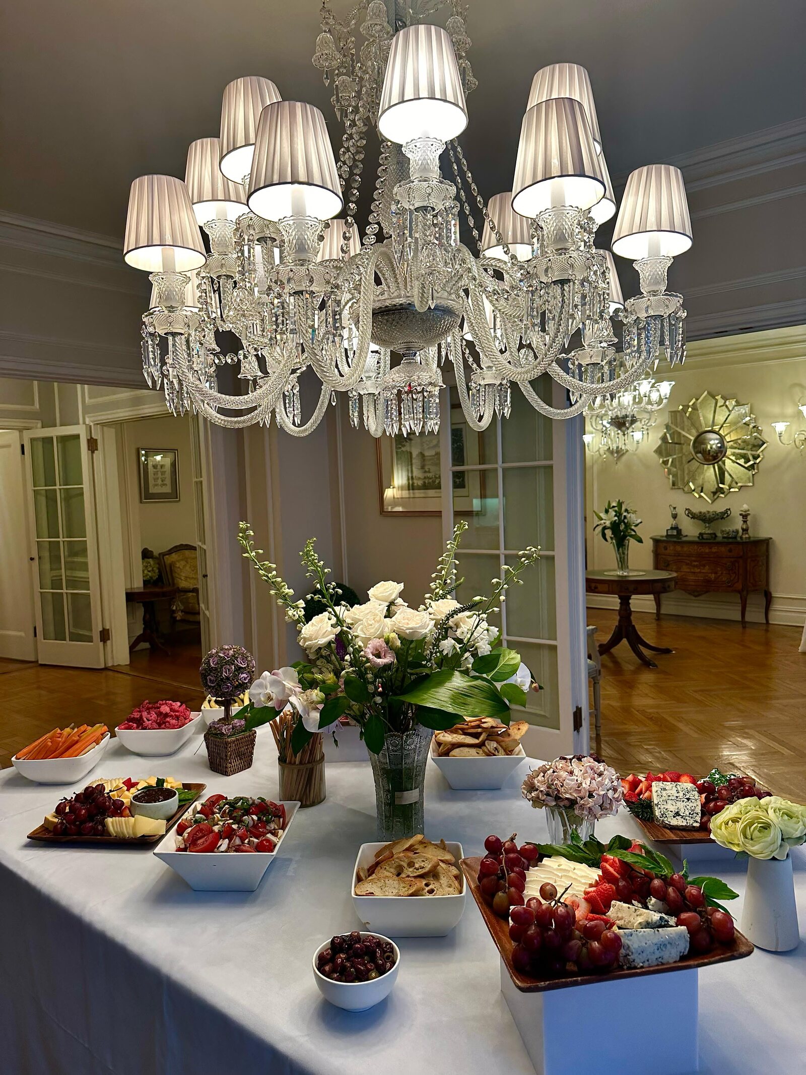 Chandeliered dining room styled for an elegant dinner