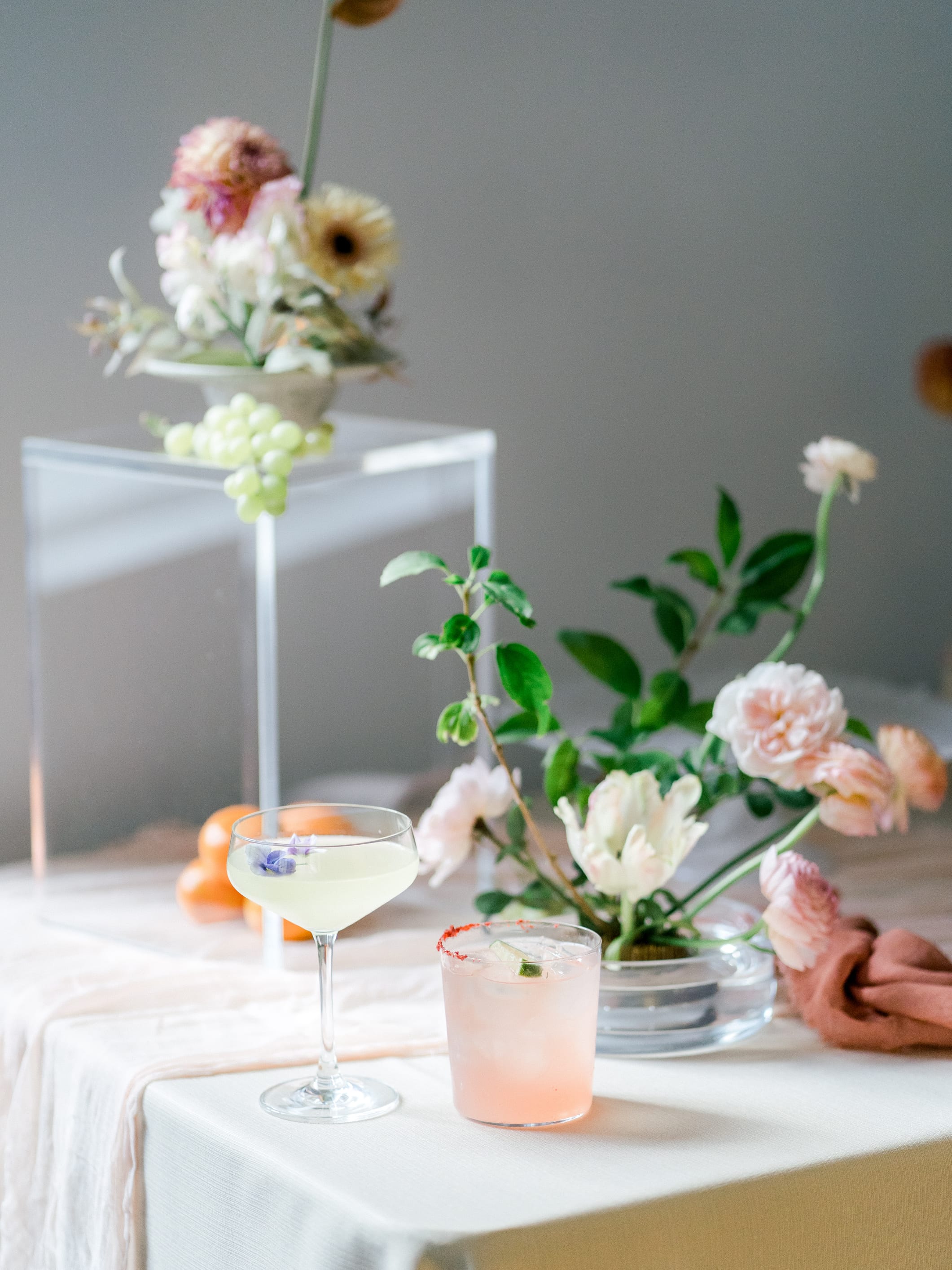 Wedding tablescape with coral florals and candles